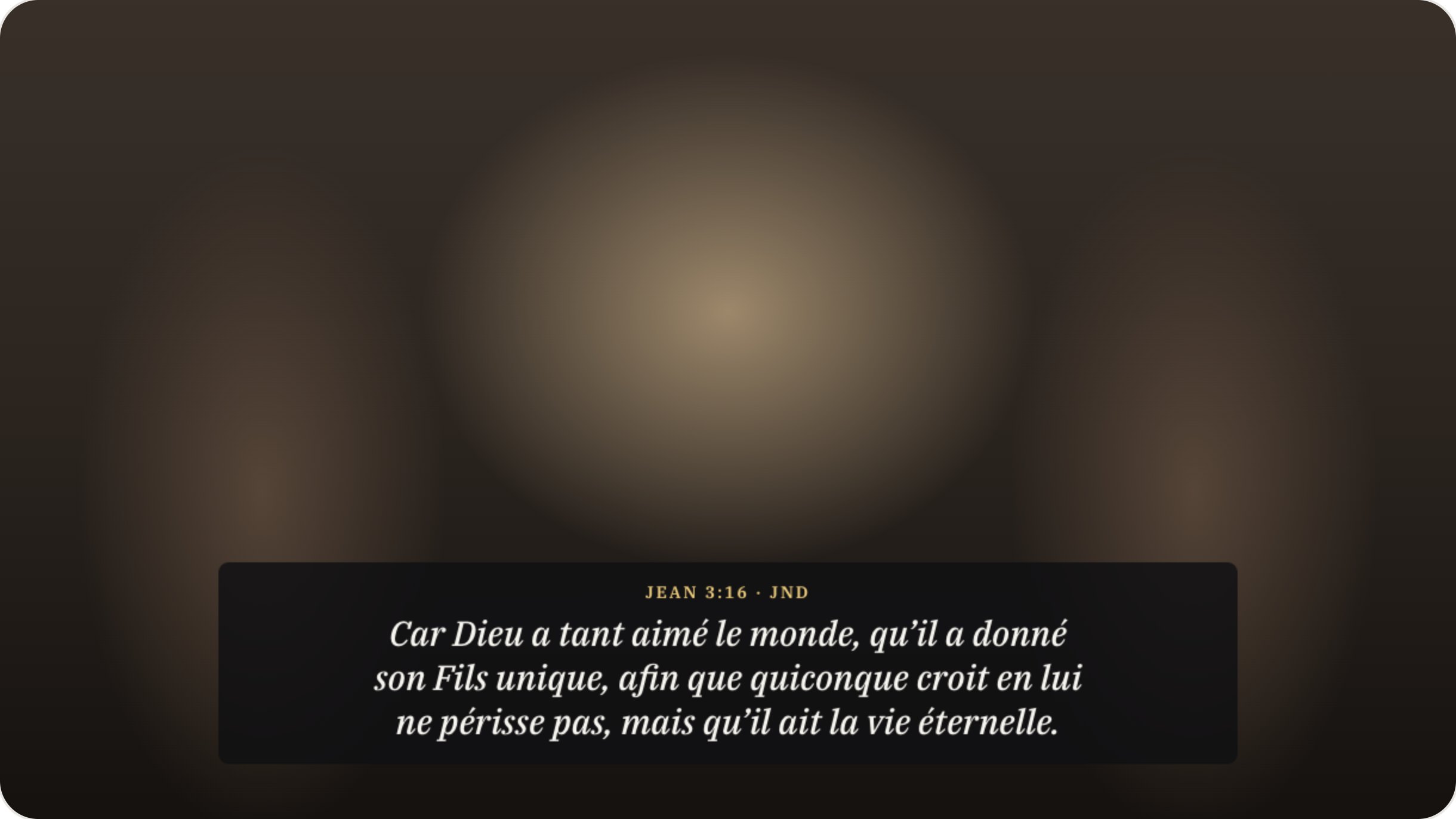 Jean 3:16 dans un cadre sombre avec sa référence en jaune.